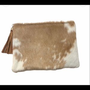 Canoe raw hide and fur clutch